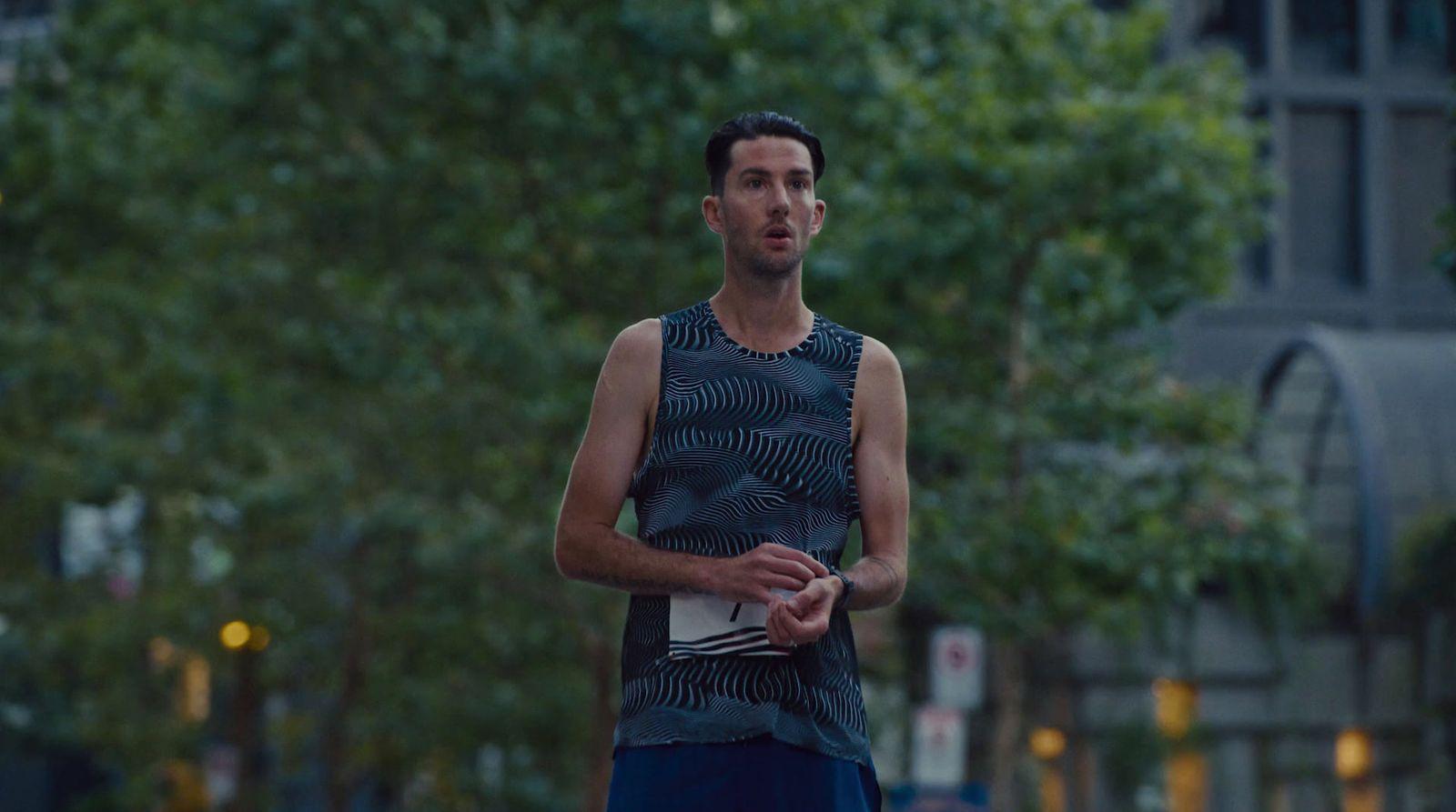 a man standing in the middle of a street