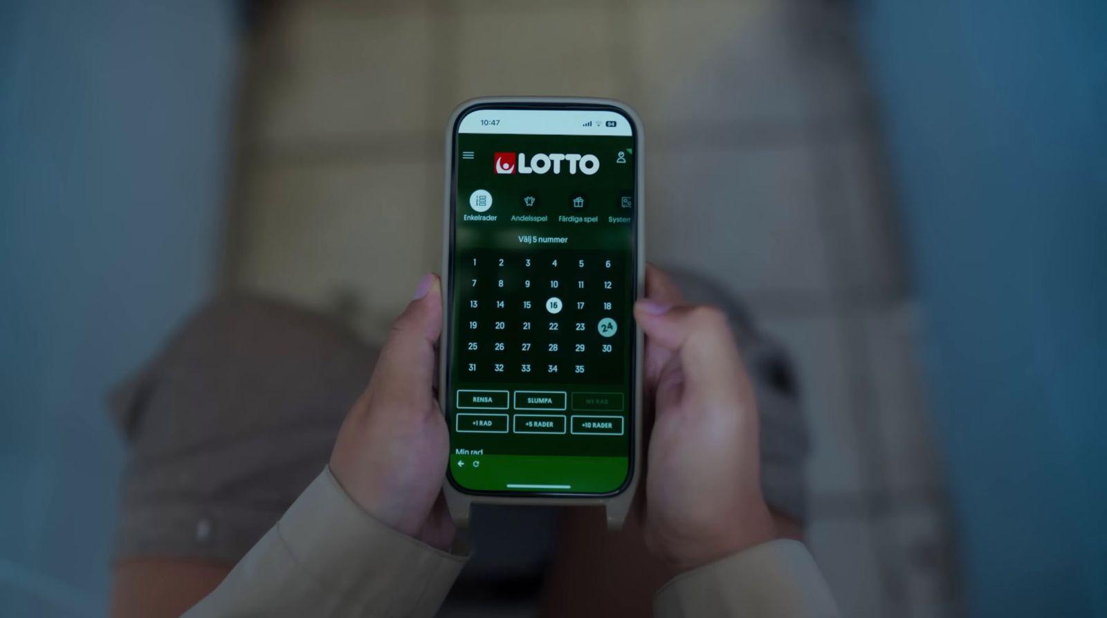 a person holding a cell phone in their hands