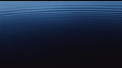 a dark blue background with ripples of water
