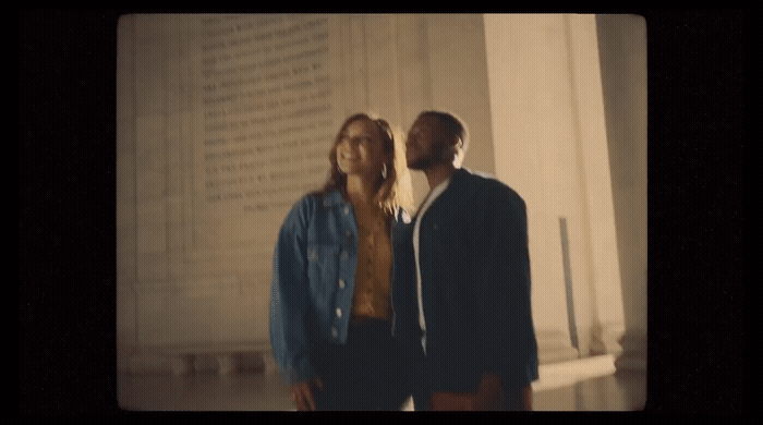a man and a woman standing next to each other