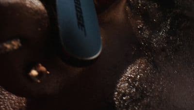 a close up of a toothbrush in a persons mouth