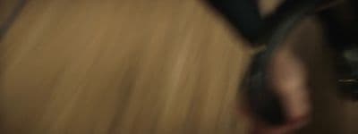 a blurry photo of a person riding a skateboard