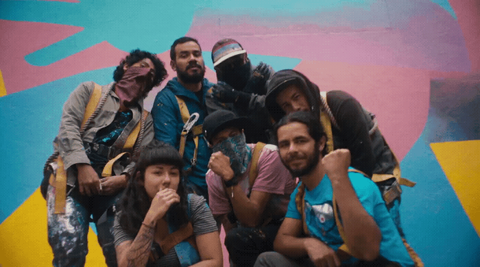 a group of people standing next to each other