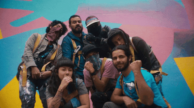 a group of people standing next to each other