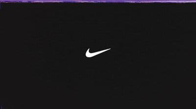 a white nike logo on a black background