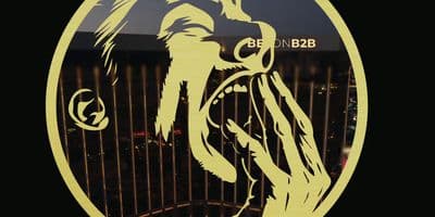 a close up of a logo on a fence