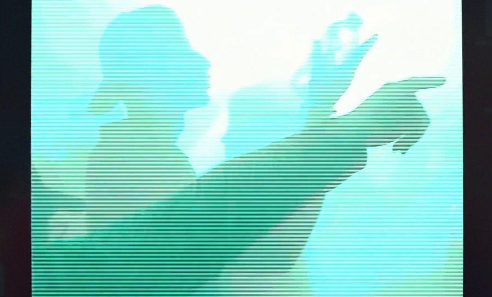 a blurry photo of a person holding a cell phone