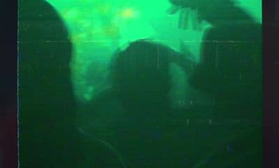 a group of people standing next to each other