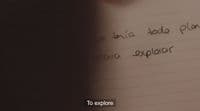 a notepad with writing on it and a pen