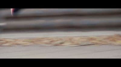 a blurry photo of a person riding a skateboard