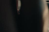 a blurry photo of a person's reflection in a mirror