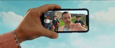 a man taking a picture of himself in a mirror