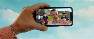 a man taking a picture of himself in a mirror
