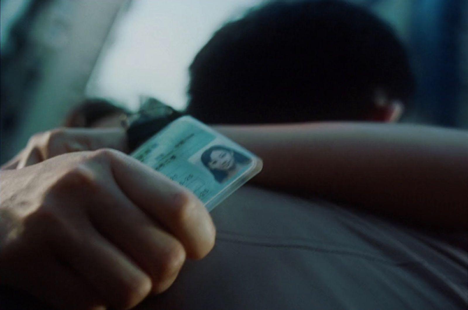 a close up of a person holding a cell phone