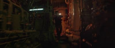 a room filled with lots of pipes and wires