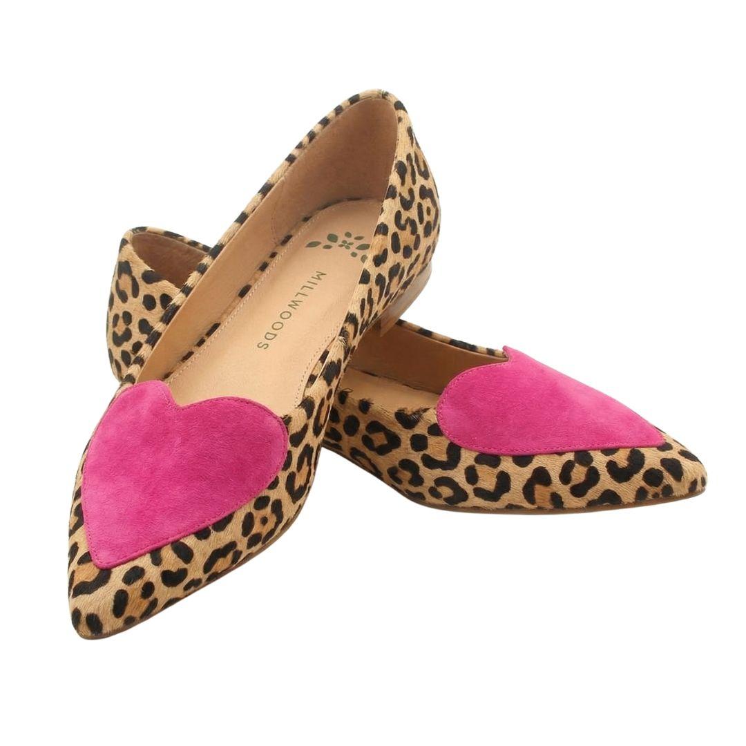 a pair of pink and leopard print shoes
