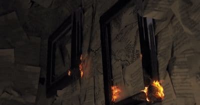 a fire burning through a window in a room