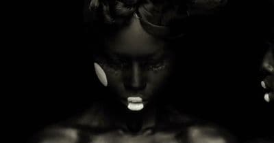 a black and white photo of a woman's face