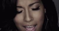 a close up of a person with her mouth open