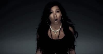 a woman with a surprised look on her face