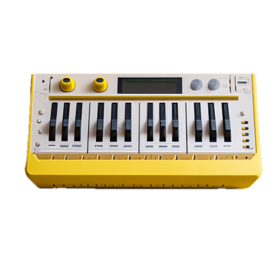 a yellow and white electronic keyboard on a black background