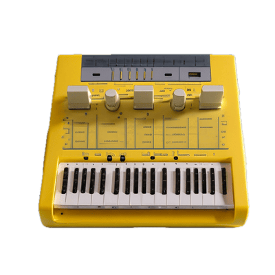 a yellow and black keyboard sitting on top of a table