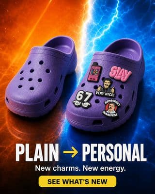 a pair of purple clogs with stickers on them