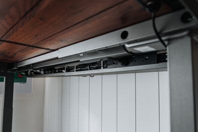 a close up of a metal and wood ceiling