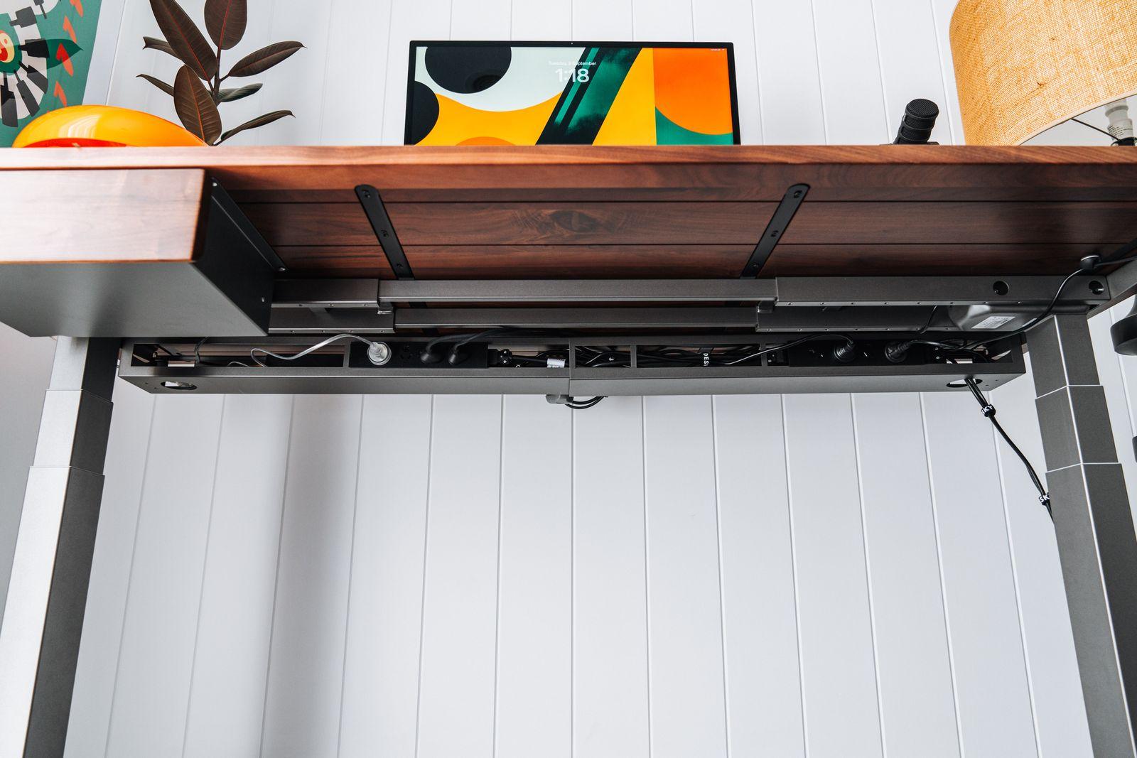 a shelf with a wooden box on top of it