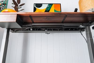 a shelf with a wooden box on top of it