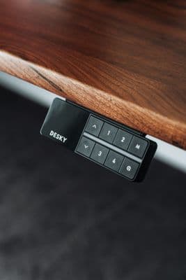 a close up of a remote control on a table