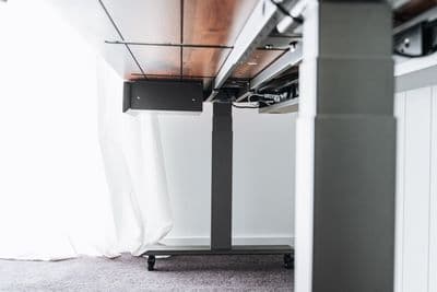 a picture of a room with a white curtain