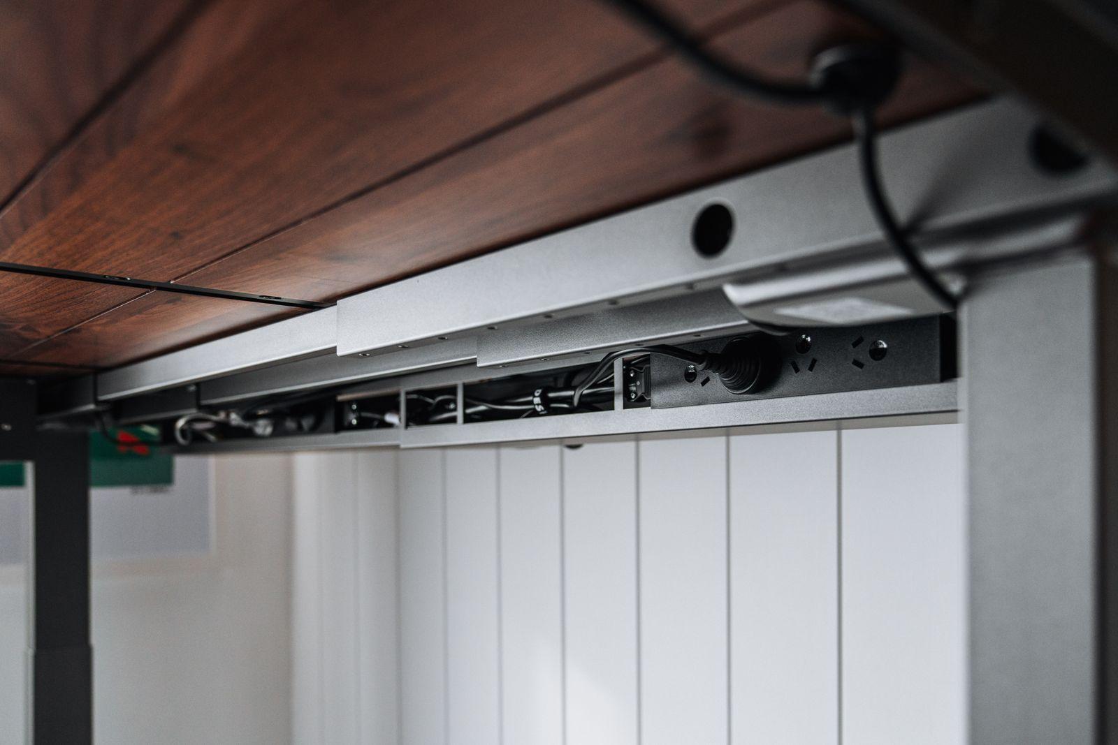 a close up of a metal and wood ceiling