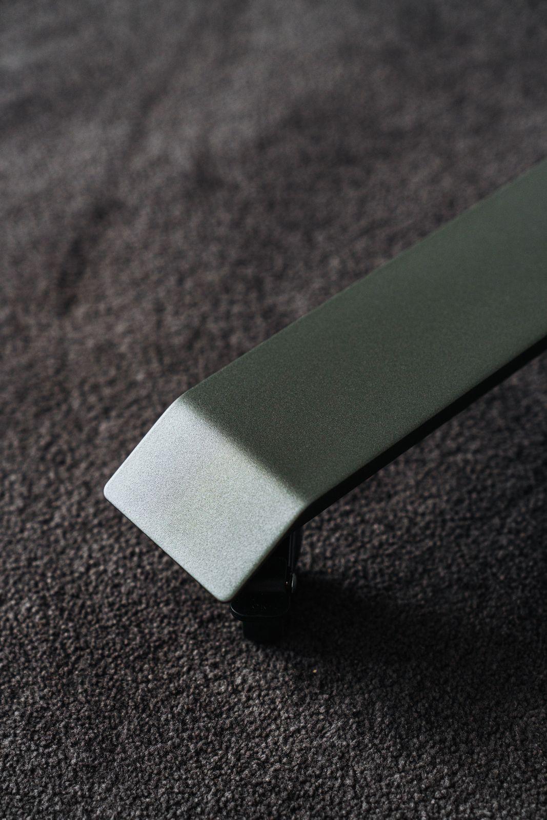 a close up of a metal object on a carpet