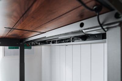 a close up of a metal and wood ceiling
