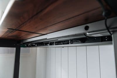 a close up of a metal and wood ceiling