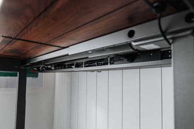 a close up of a metal and wood ceiling