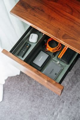 a drawer is open to show the contents of a computer