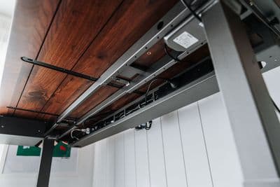 a close up of a metal and wood ceiling