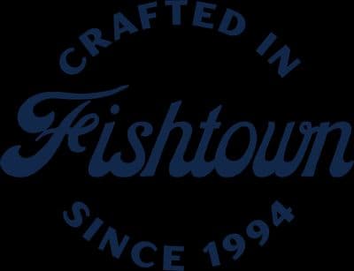 a black and blue sign that says crafted in fishtown since 1994