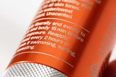 a close up of a bottle of sunscreen