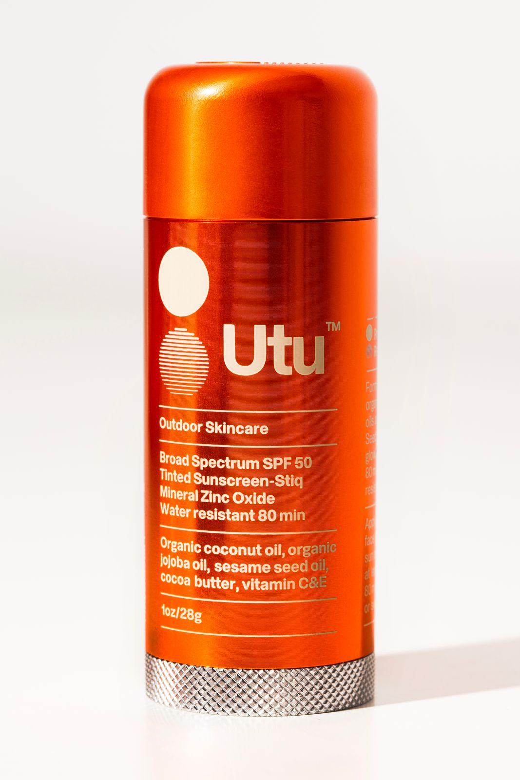 a close up of a can of deodorant on a white surface