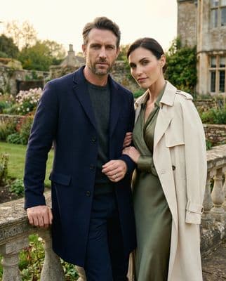 a man and a woman standing next to each other