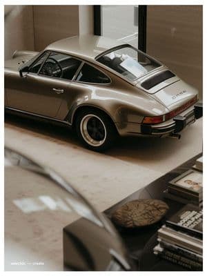 a silver car parked on top of a table