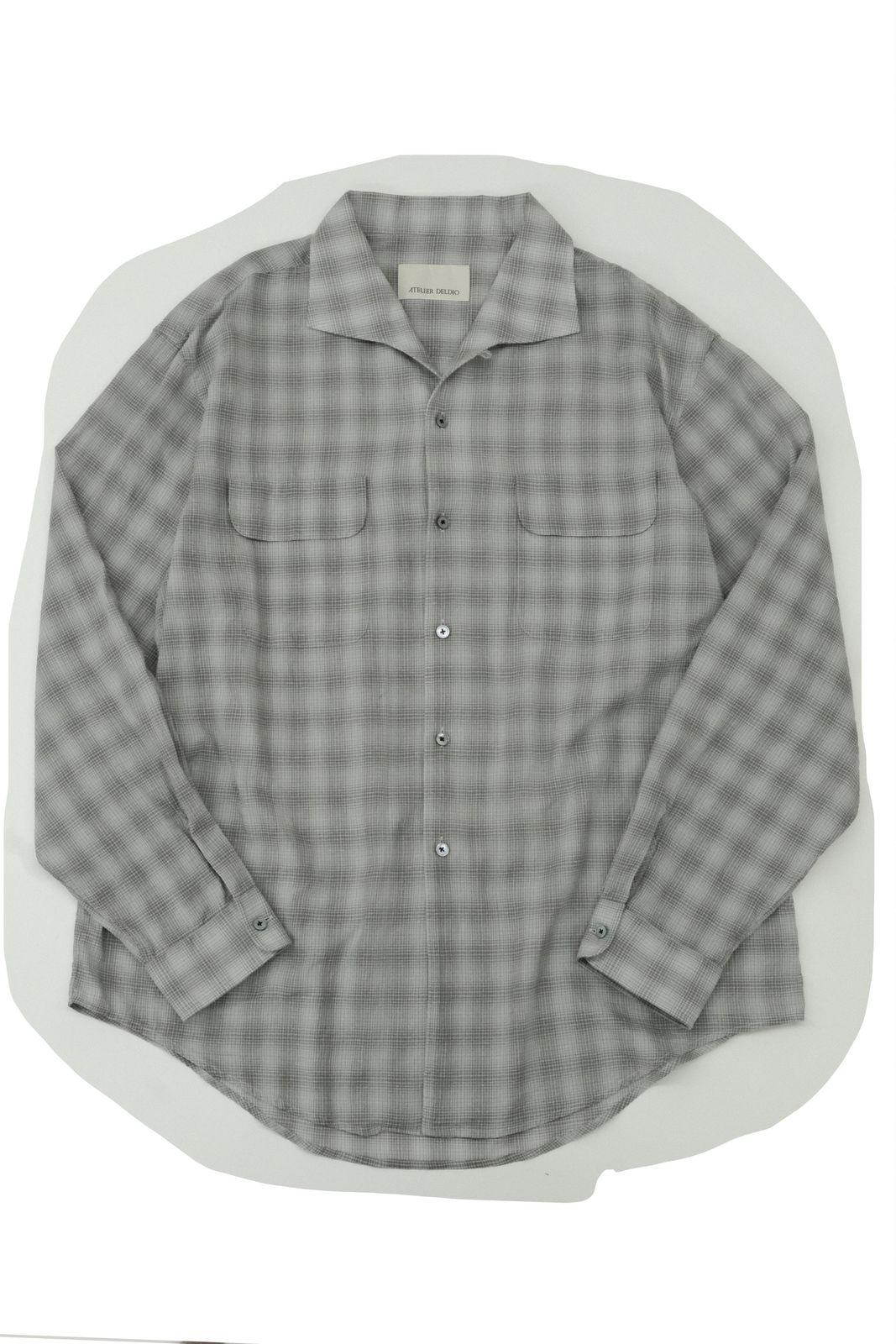 a gray and white checkered shirt on a white background
