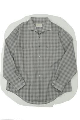 a gray and white checkered shirt on a white background