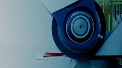 a close up of a speaker on a pole