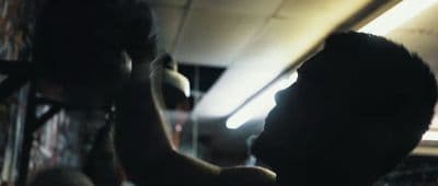 a blurry photo of a person holding a cell phone