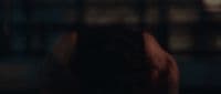 a blurry image of a person's head in the dark