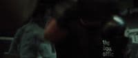a blurry photo of a person wearing a jacket